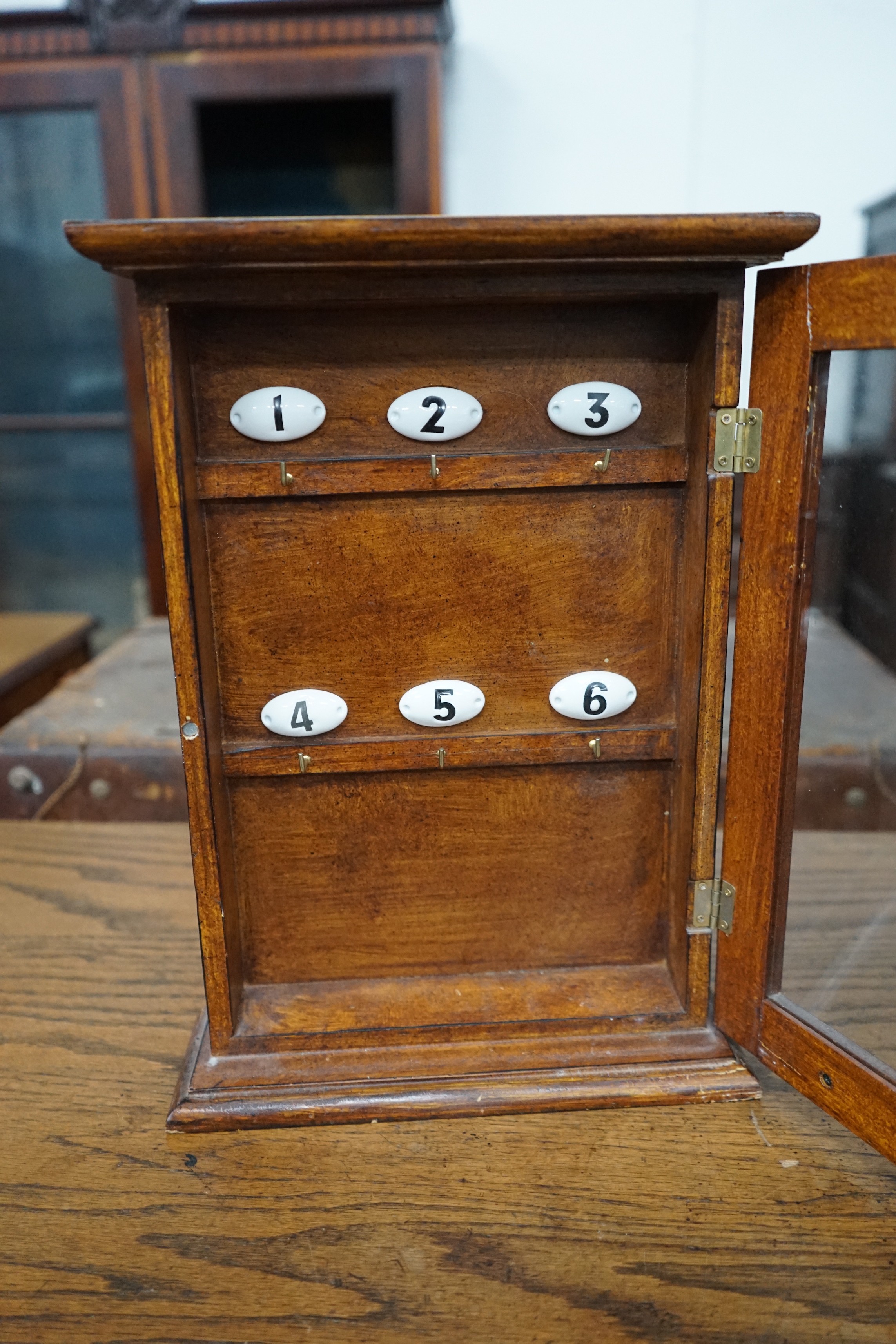 A Victorian style mahogany key box, height 36cm